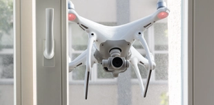 Drone spying in a window